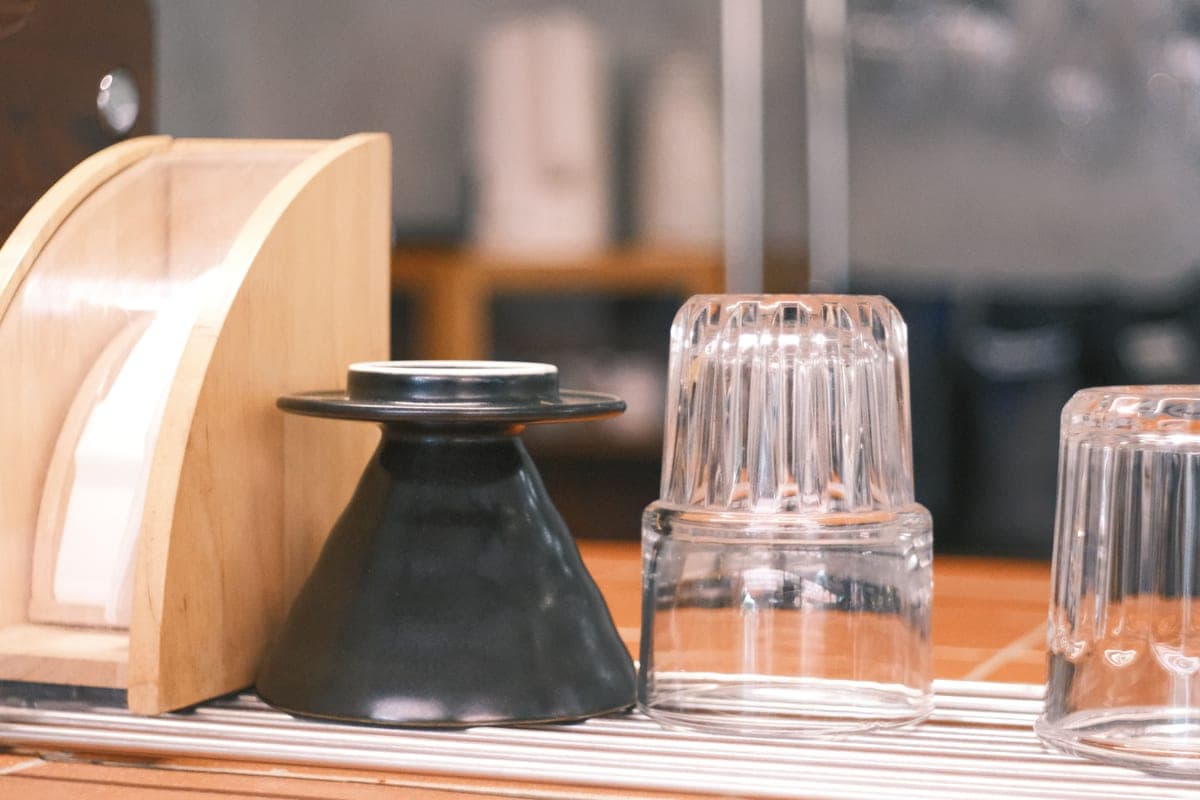 A clean empty glass dish drying