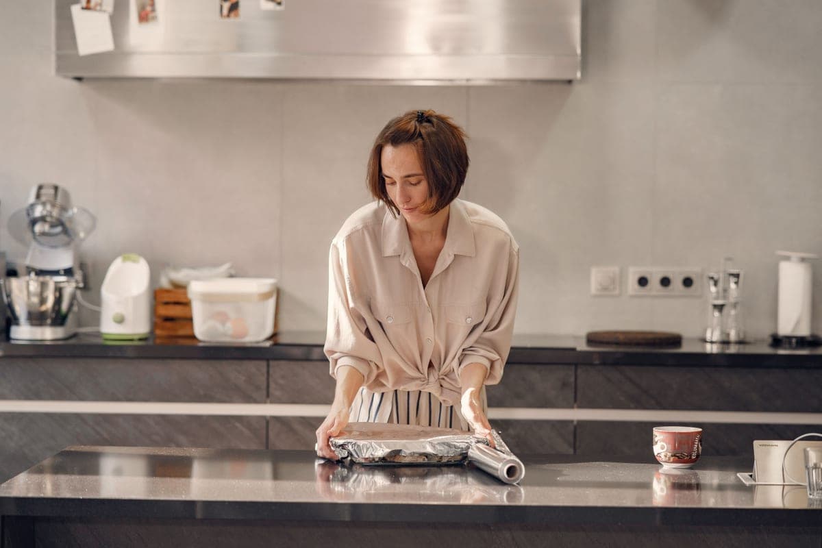 A roll of aluminum foil on a counter