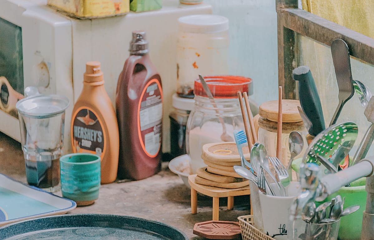 Glass jars and plastic bottles side by side